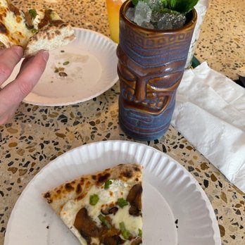 Sunroom - This pizza was the perfect homerun to her first night of cocktails! - Cocktail Bars Near Me - Orlando, Florida Sunroom - This pizza was the perfect homerun to her first night of cocktails! - Cocktail Bars Near Me - Orlando, Florida