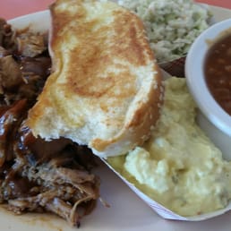 Pork plate with slaw, potato salad, and beans Pork plate with slaw, potato salad, and beans