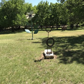 Salado Sculpture Garden - Flower power is no match for my glower power (a Mr. Burns classic) - Botanical Gardens Near Me - Salado, Texas Salado Sculpture Garden - Flower power is no match for my glower power (a Mr. Burns classic) - Botanical Gardens Near Me - Salado, Texas