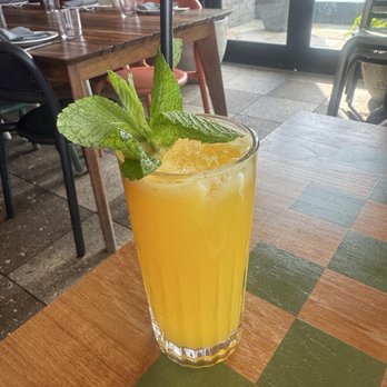 Laser Wolf - Mocktail with passion fruit an orange juice - Middle Eastern Near Me - Brooklyn, New York