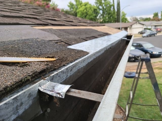Slide of Quinn Bro's Roofing