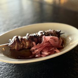 $12 LAMB SHOULDER SKEWER: perfectly cooked, slightly crispy on the outside, but tender and juicy on the inside.