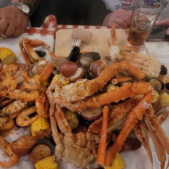 The Crab Pot - 2 orders of the feast & 2 more orders of shrimp & crab legs. Cost over $300 - 1 plate of fish tacos 4 cokes, & 3 cups of clam chowder. - Seafood Near Me - Seattle, Washington The Crab Pot - 2 orders of the feast & 2 more orders of shrimp & crab legs. Cost over $300 - 1 plate of fish tacos 4 cokes, & 3 cups of clam chowder. - Seafood Near Me - Seattle, Washington