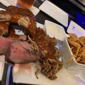 HELLUVA Brewing Company - Tri-tip, ribs and pulled pork with friend onion strings and a side of horseradish sauce. - Brewpubs Near Me - Chandler, Arizona