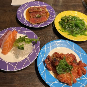 Sushi Train - Sashimi, Baby Octopus Sushi - 4 Pieces, seaweed salad, Tuna Tataki Sushi. - Sushi Bars Near Me - Minneapolis, Minnesota Sushi Train - Sashimi, Baby Octopus Sushi - 4 Pieces, seaweed salad, Tuna Tataki Sushi. - Sushi Bars Near Me - Minneapolis, Minnesota