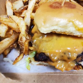 Just Slide - a cheeseburger and french fries - Burgers Near Me - North Kansas City, Missouri
