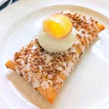Taste on Main - Hill Country Bourbon Peach Hand Pie with candied pecans and vanilla ice cream - Seafood Near Me - Buda, Texas Taste on Main - Hill Country Bourbon Peach Hand Pie with candied pecans and vanilla ice cream - Seafood Near Me - Buda, Texas
