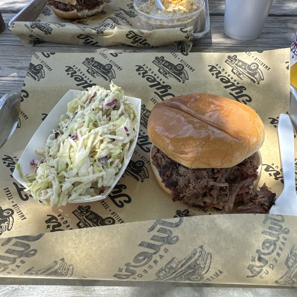 Tyler's Barbeque - Chopped brisket sandwich, coleslaw and jalapeño cream corn - Barbeque Near Me - Amarillo, Texas Tyler's Barbeque - Chopped brisket sandwich, coleslaw and jalapeño cream corn - Barbeque Near Me - Amarillo, Texas