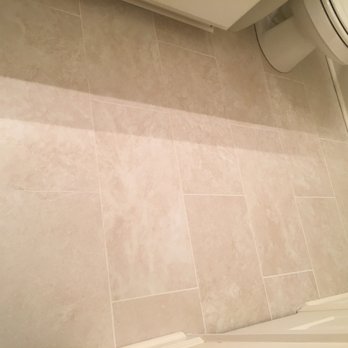 J Wood Flooring - Spanish tile in the bathroom from the right lateral angle for viewing. - Flooring Near Me - Pineville, North Carolina