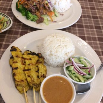 Thai Nakorn - LUNCH SPECIAL Chicken satay: peanut sauce, rice, and some veggie dip Pra Kam: rice - Thai Near Me - San Bruno, California Thai Nakorn - LUNCH SPECIAL Chicken satay: peanut sauce, rice, and some veggie dip Pra Kam: rice - Thai Near Me - San Bruno, California