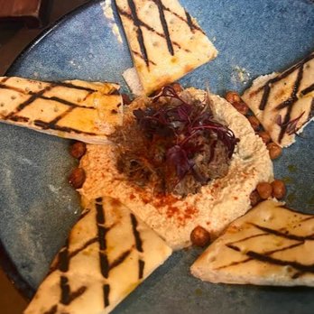 Traveler's Table - Hummus with lamb - Cocktail Bars Near Me - Houston, Texas