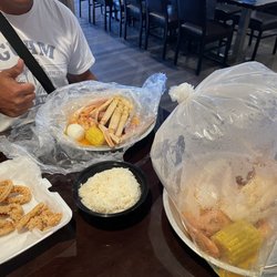 Yama Hibachi & Juicy Seafood - D2. Snow crab & shrimp (head on) with the garlic butter seasoning (mild & medium)
