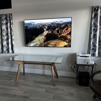 EZ TV Mounting - Perfectly centered between windows and again no reflection.. - Home Theatre Installation Near Me