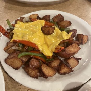 Gingham's Homestyle Restaurant - American Fries with added peppers, onions, and American cheese - American Near Me - Saint Charles, Missouri Gingham's Homestyle Restaurant - American Fries with added peppers, onions, and American cheese - American Near Me - Saint Charles, Missouri