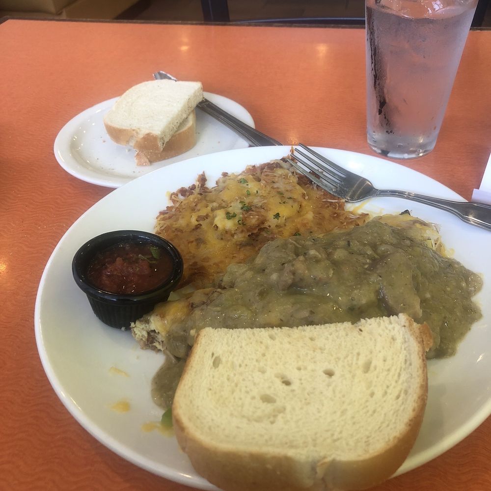 Yolkizz Cafe - Colorado omelet, with side order of green chili on top - Breakfast & Brunch Near Me - Edmond, Oklahoma Yolkizz Cafe - Colorado omelet, with side order of green chili on top - Breakfast & Brunch Near Me - Edmond, Oklahoma
