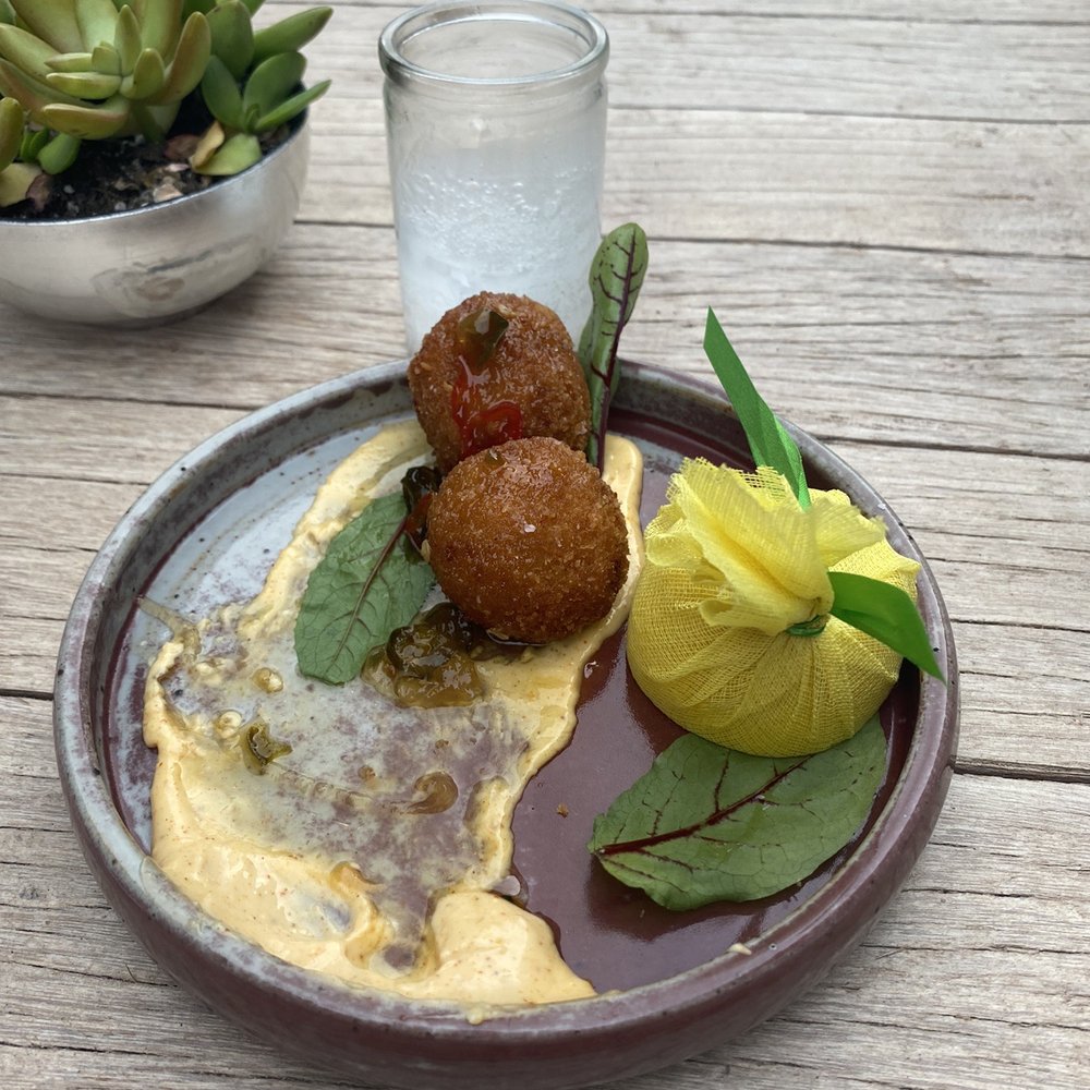 Roots - Crawfish croquettes. It's comes wit 4. Delicious dish. - Wine Bars Near Me - Houston, Texas Roots - Crawfish croquettes. It's comes wit 4. Delicious dish. - Wine Bars Near Me - Houston, Texas