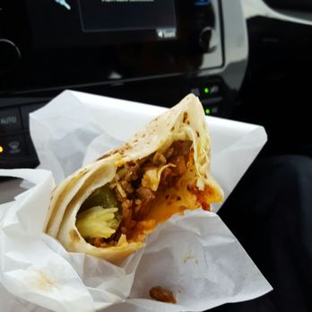 El Charrito - El pastor being eaten in the car - Mexican Near Me - Salinas, California