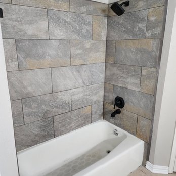 Hand E Man Services - a bathtub and shower - General Contractors Near Me