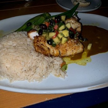 Calusa - Grouper with curry sauce and coconut rice.. YUUUMM - American Near Me - Key Largo, Florida
