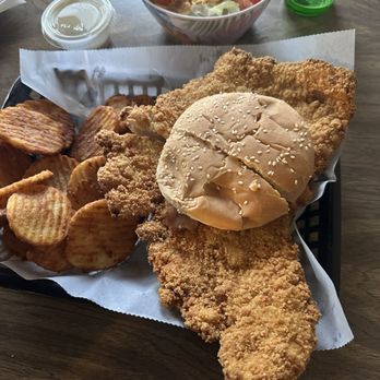 Pour House - The pork tenderloin sandwich, dinner salad and buffalo chips. - Pubs Near Me - Gas City, Indiana Pour House - The pork tenderloin sandwich, dinner salad and buffalo chips. - Pubs Near Me - Gas City, Indiana