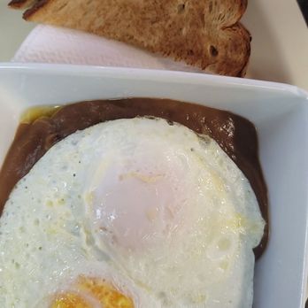 Coffee Shoppe - Loco moco, a classic hawaiian comfort food. Under the eggs are a hamburger patty smothered with gravy and rice underneath. - Coffee & Tea Near Me - Niceville, Florida Coffee Shoppe - Loco moco, a classic hawaiian comfort food. Under the eggs are a hamburger patty smothered with gravy and rice underneath. - Coffee & Tea Near Me - Niceville, Florida