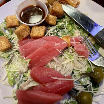 Sully's Gulfport - Ahi tuna sashimi style with citrus soy dipping sauce over a Caesar salad - light and refreshing - Steakhouses Near Me - Gulfport, Mississippi Sully's Gulfport - Ahi tuna sashimi style with citrus soy dipping sauce over a Caesar salad - light and refreshing - Steakhouses Near Me - Gulfport, Mississippi