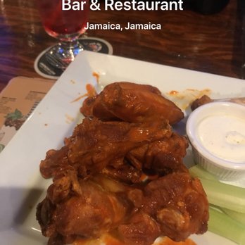 Sangria Tapas Bar & Restaurant - Buffalo wings with Vodka & a splash of cranberry - Tapas Bars Near Me - Jamaica, New York