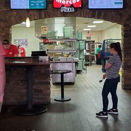 a man on a skateboard in a restaurant a man on a skateboard in a restaurant