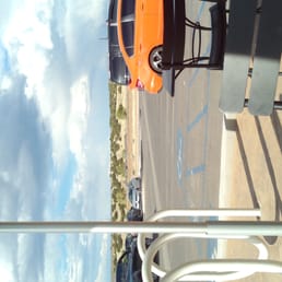 View from outside, including the parking lot, bike rack, and buttes.