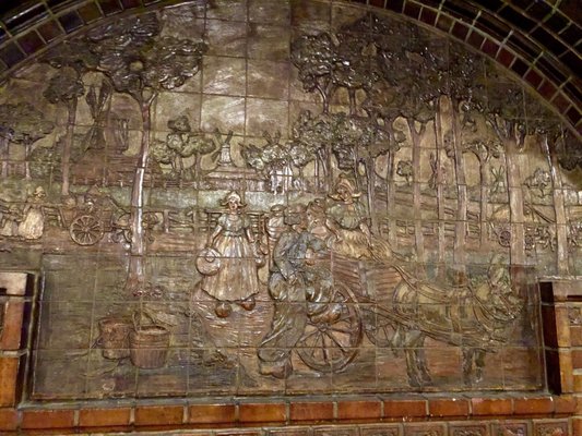 Photo of The Dutch Chocolate Shop - Los Angeles, CA, US. Batchelder tile frieze in rear section beneath groin vault
