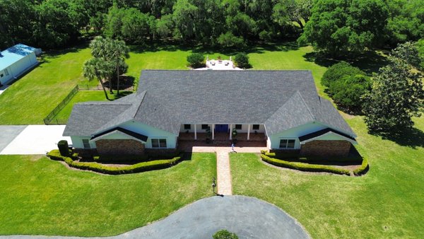 Gecko Roofing Pros Logo