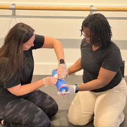 RSQ Training - These personal trainers are practicing their first aid skills during their certification course