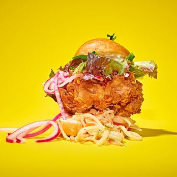 Baby's Buns & Buckets - a fried chicken sandwich with coleslaw - Thai Near Me - Brooklyn, New York