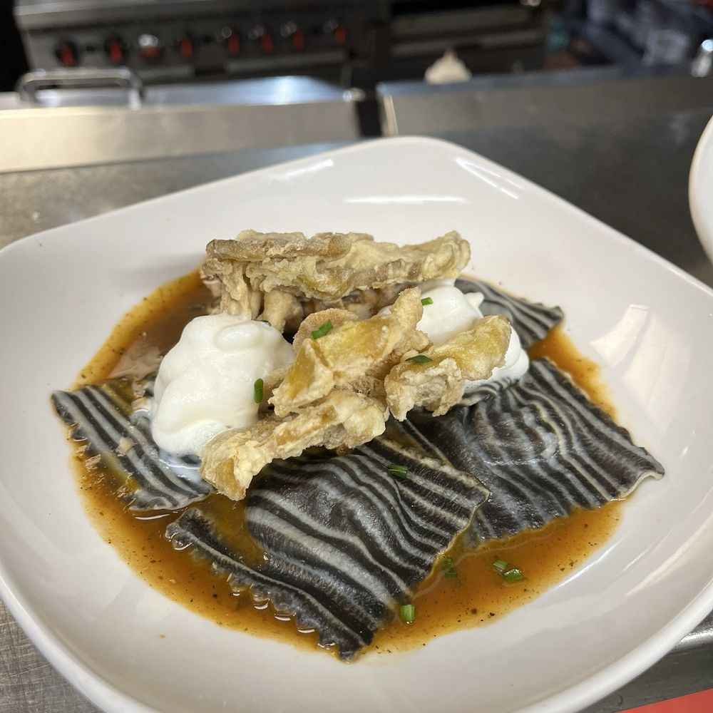 Cena Hammond - Squid ink pin striped ravioli filled with smoked mushrooms and local pork belly in a rich pork demi - Italian Near Me - Hammond, Louisiana Cena Hammond - Squid ink pin striped ravioli filled with smoked mushrooms and local pork belly in a rich pork demi - Italian Near Me - Hammond, Louisiana