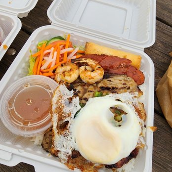 Pho King - two take out containers of food on a picnic table - Vietnamese Near Me - Edmonton, Alberta Pho King - two take out containers of food on a picnic table - Vietnamese Near Me - Edmonton, Alberta
