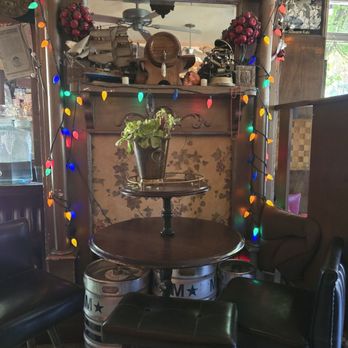 Karma Brew - Decor next to table and chairs - Karma Brew bar Sunday, 5/17/2026 - Bars Near Me - Sacramento, California Karma Brew - Decor next to table and chairs - Karma Brew bar Sunday, 5/17/2026 - Bars Near Me - Sacramento, California