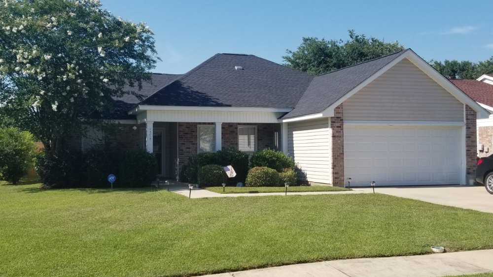 Slide of Expert Roofing