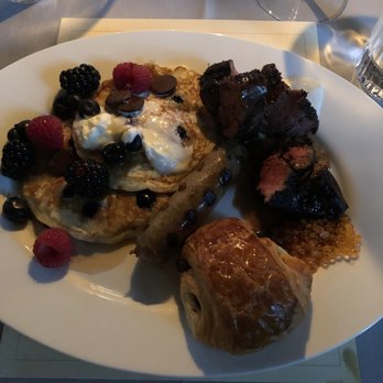 Maple & Ash - Pancakes, sausage, filet mignon and pain au chocolat - Steakhouses Near Me - Chicago, Illinois Maple & Ash - Pancakes, sausage, filet mignon and pain au chocolat - Steakhouses Near Me - Chicago, Illinois
