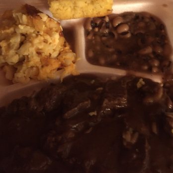 Ronnie's Buffet - Stew beef over rice, macaroni and cheese, black eye peas and cornbread to go order - American Near Me - Newberry, South Carolina