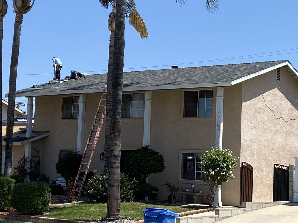 Slide of K & H Roofing