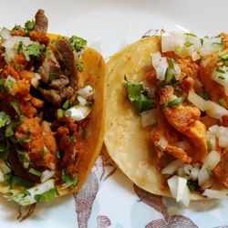 La Mixteca Poblana - Mixteco Taco with steak, pork, and chorizo next to a chicken taco.