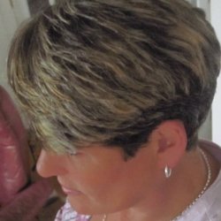 Tonja Haskins- Sola Salon Studios - Highlights & Cut by Tonja