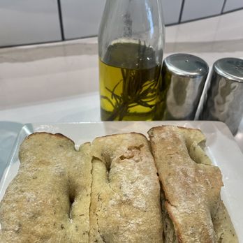 Mercantile Dining & Provision DIA - Side focaccia bread with olive oil and s/p - Coffee & Tea Near Me - Denver, Colorado Mercantile Dining & Provision DIA - Side focaccia bread with olive oil and s/p - Coffee & Tea Near Me - Denver, Colorado