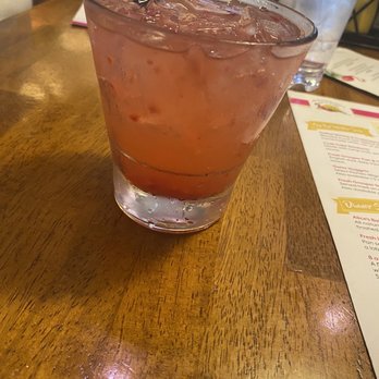Alice Sweetwater's Bar & Grille - Raspberry Lemonade with mulled raspberries and Tito's - American Near Me - Naples, Florida