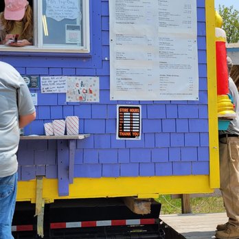 Burger Barn - a woman and a child in a window - Food Stands Near Me