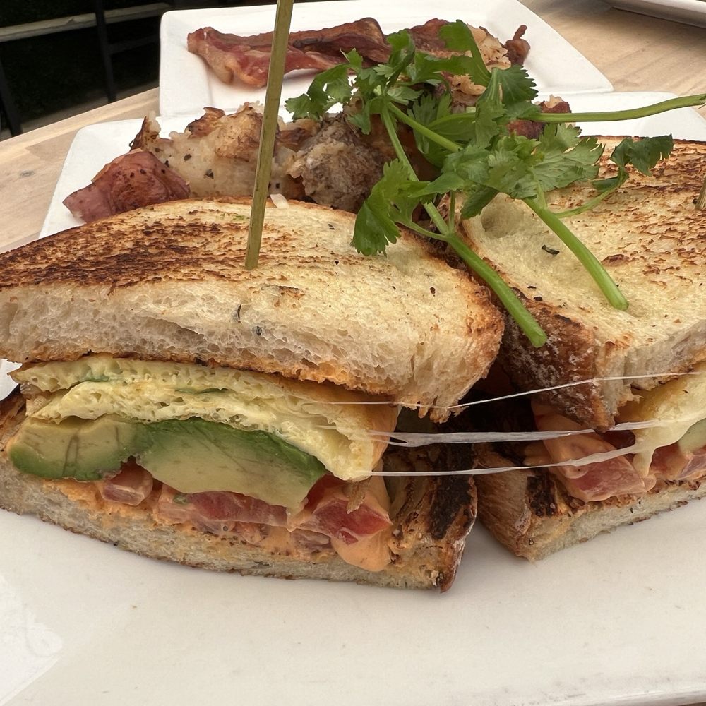 Naked Cafe - Breakfast sandwich, I asked for the bacon on the side. Absolutely devine!! - Breakfast & Brunch Near Me - Solana Beach, California Naked Cafe - Breakfast sandwich, I asked for the bacon on the side. Absolutely devine!! - Breakfast & Brunch Near Me - Solana Beach, California