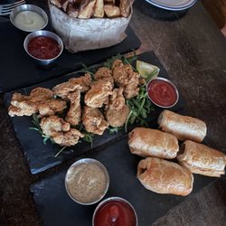 The Workman's Friend - Bag of chips, fried oysters, sausage rolls