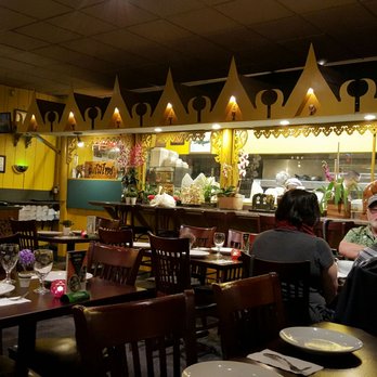 Rom Mai Thai - open dining area with view of cooking ares - Thai Near Me - Seattle, Washington Rom Mai Thai - open dining area with view of cooking ares - Thai Near Me - Seattle, Washington