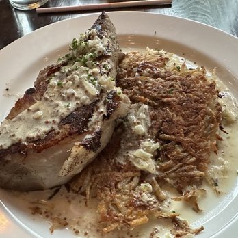 Branch Line - Berkshire pork chop.  Note the oddly gray color of the meat (the left tip in photo), which ran through the entire 'medium well' chop. - New American Near Me - Watertown, Massachusetts