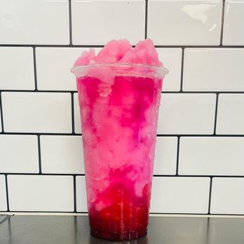 Untamed Coffee - a pink drink in a plastic cup - Coffee & Tea Near Me - Sumner, Washington Untamed Coffee - a pink drink in a plastic cup - Coffee & Tea Near Me - Sumner, Washington